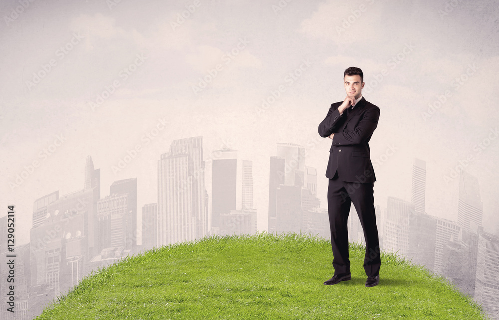 man standing in front of city landscape man standing in front of city landscape
