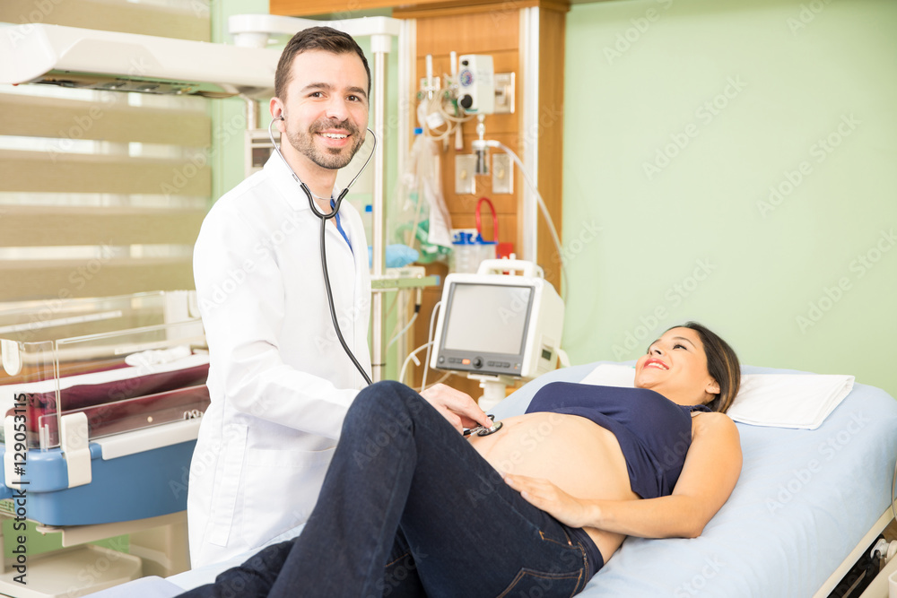 Handsome obgyn with a patient Handsome obgyn with a patient