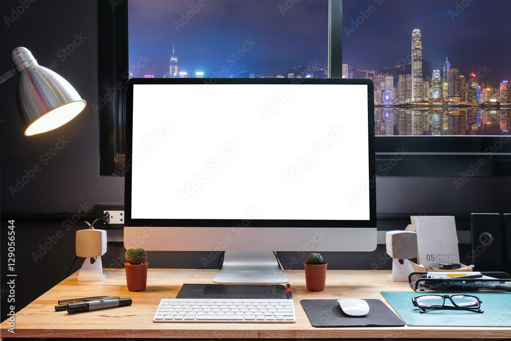 Naklejka premium Graphic Designer Workspace with city night view