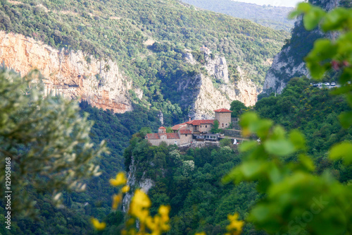 The monastery Philosopher (right) and the monastery Baptist (left) balance in the gorge and river of Lucius in Arcadia. Peloponnese, Greece photo