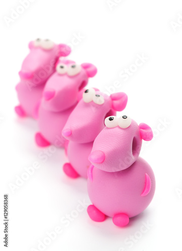 Pink mice made of polymer clay isolated on white background