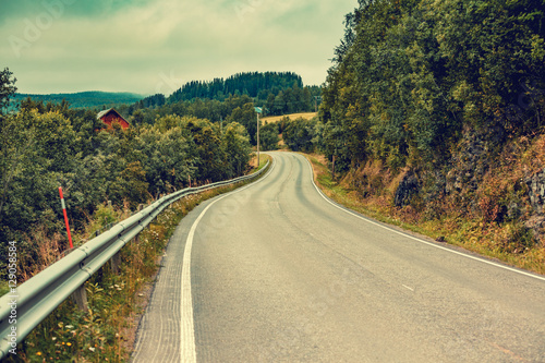 Driving a car on mountain road. Nature Norway