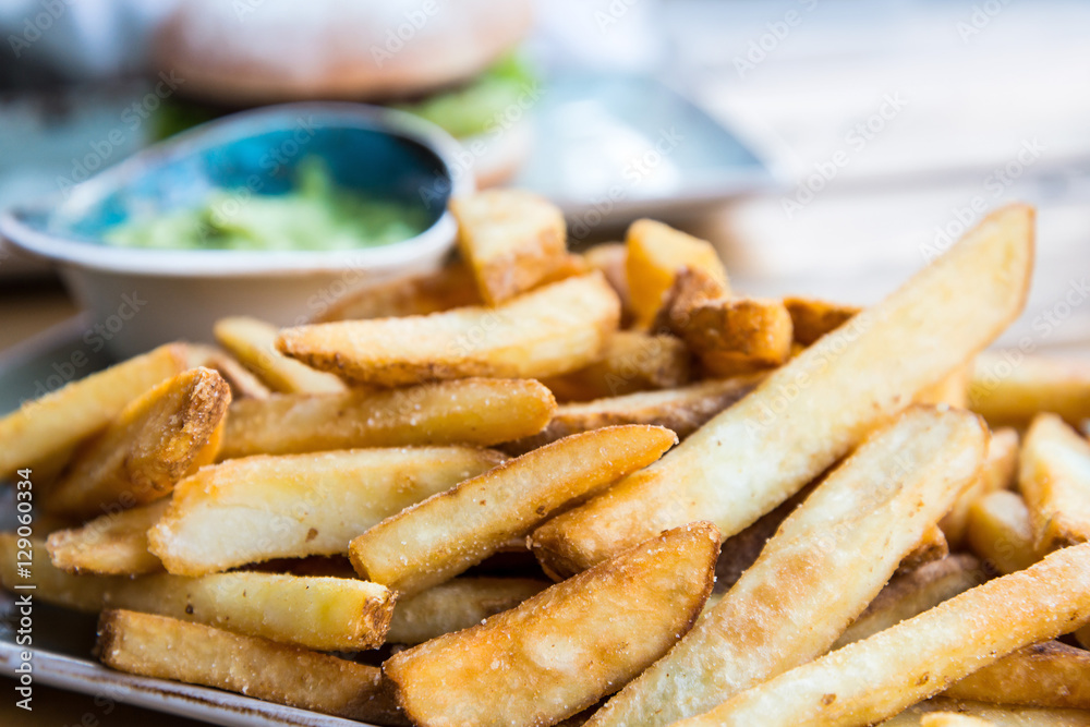 Golden French fries potatoes ready to be eaten