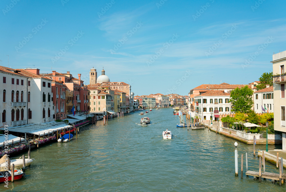 Fototapeta Tourists on water street with Gondola in Venice, ITALY