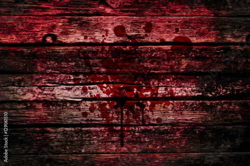 bloody wall, grunge of blood splash on wood dark tone, murder or killer death concept. photo