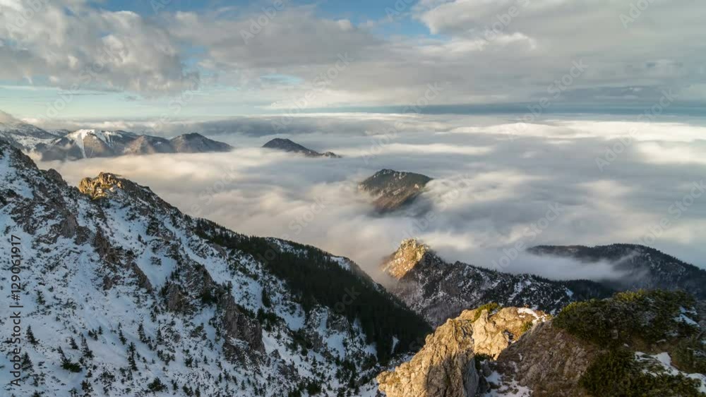 Epic foggy morning above clouds flows in winter mountains time lapse Epic foggy morning above clouds flows in winter mountains time lapse