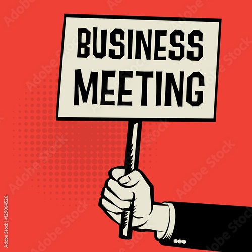 Poster in hand, business concept with text Business Meeting