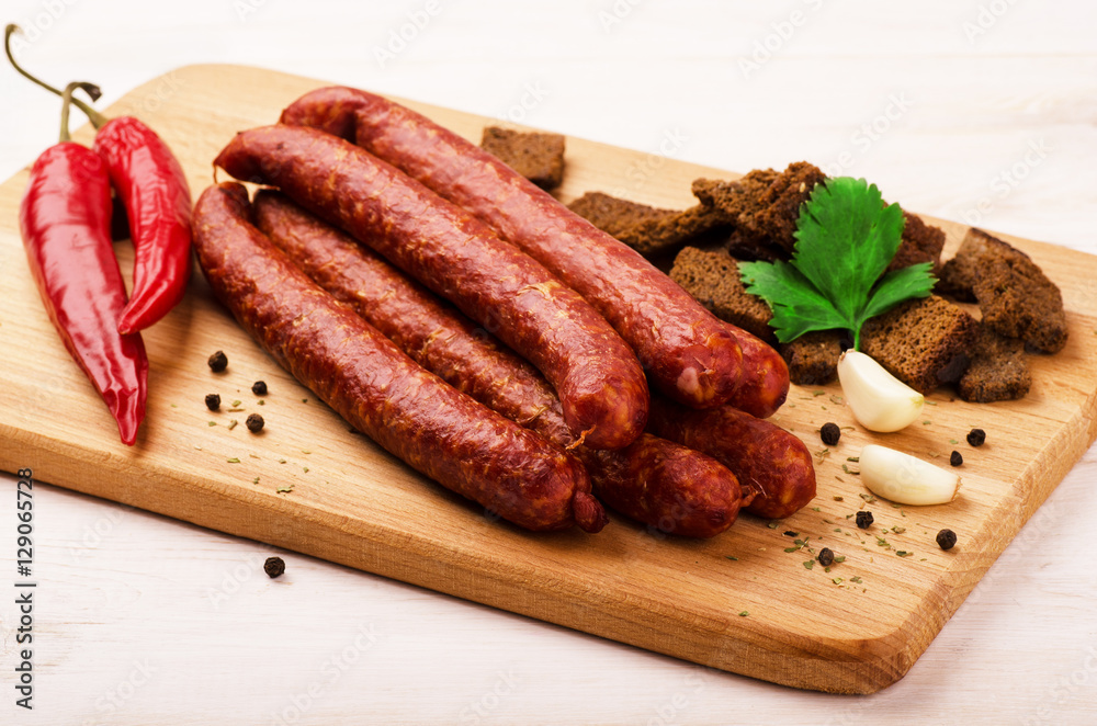 Smoked salami sausage with garlic, croutons and hot peppers