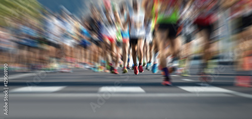 Marathon running race people feet on city road,abstract