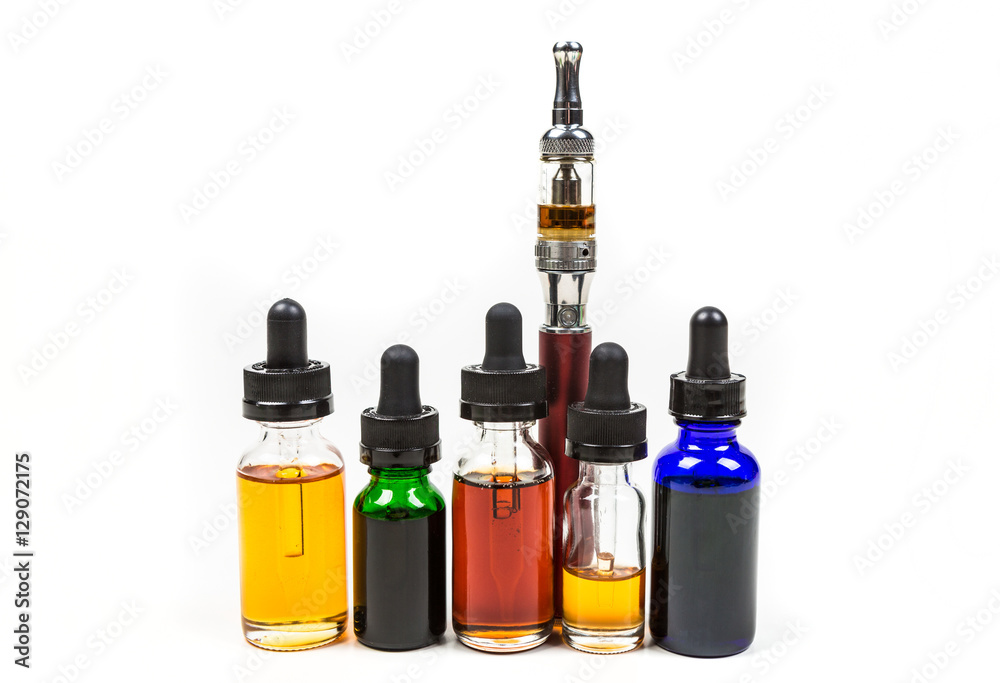 Assorted flavors of vape juice and an ecigarette isolated on white background Assorted flavors of vape juice and an ecigarette isolated on white background