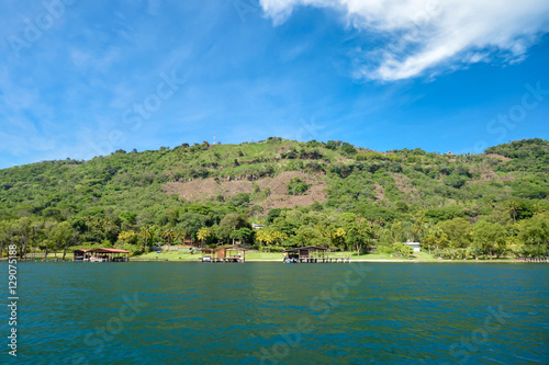 Beautiful coast and lush vegetation of the volcanic caldera Lake Coatepeque in El Salvador. Central America