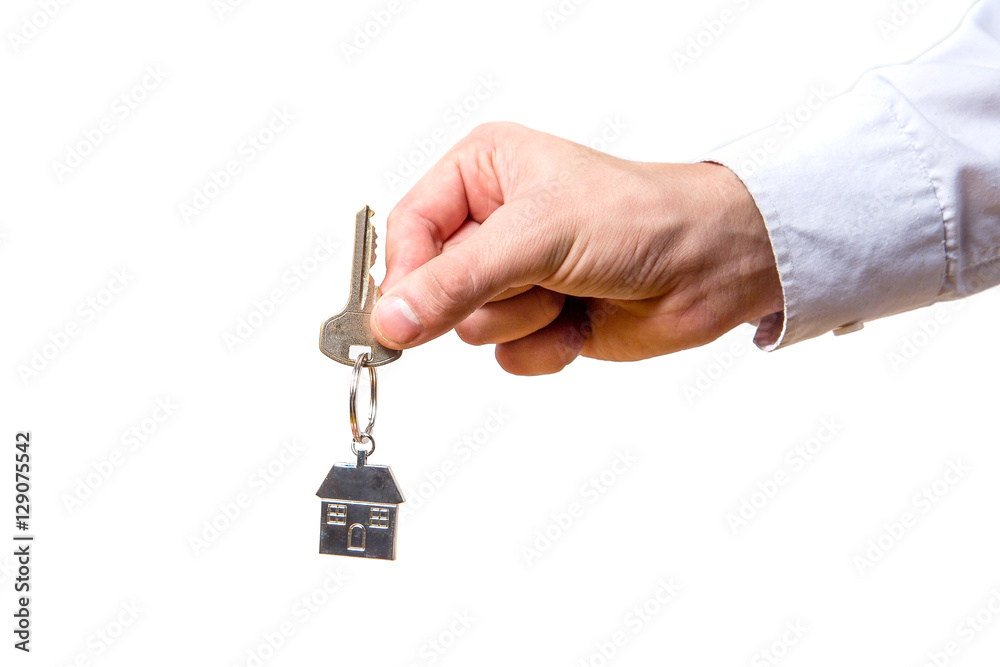 hand holding house keys on white background StockFoto Adobe Stock
