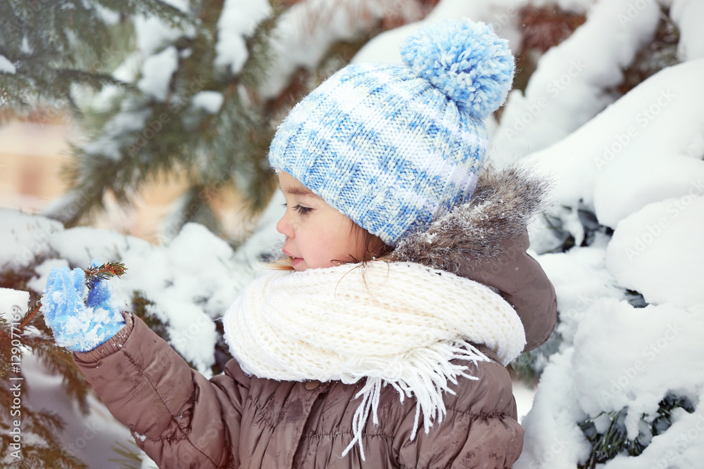 Cute little girl outdoors on winter day Cute little girl outdoors on winter day
