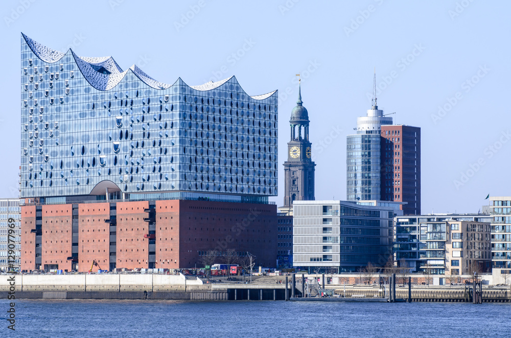 Hamburg view at harbour city with St Michaelis Church and Elbe Philharmonic Hall