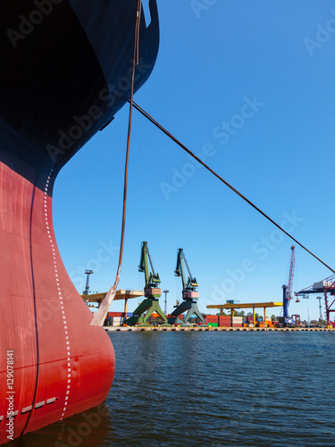 A bow of a ship with water depth gauge. photo