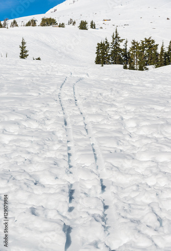 ski track in ski resort area. © checubus