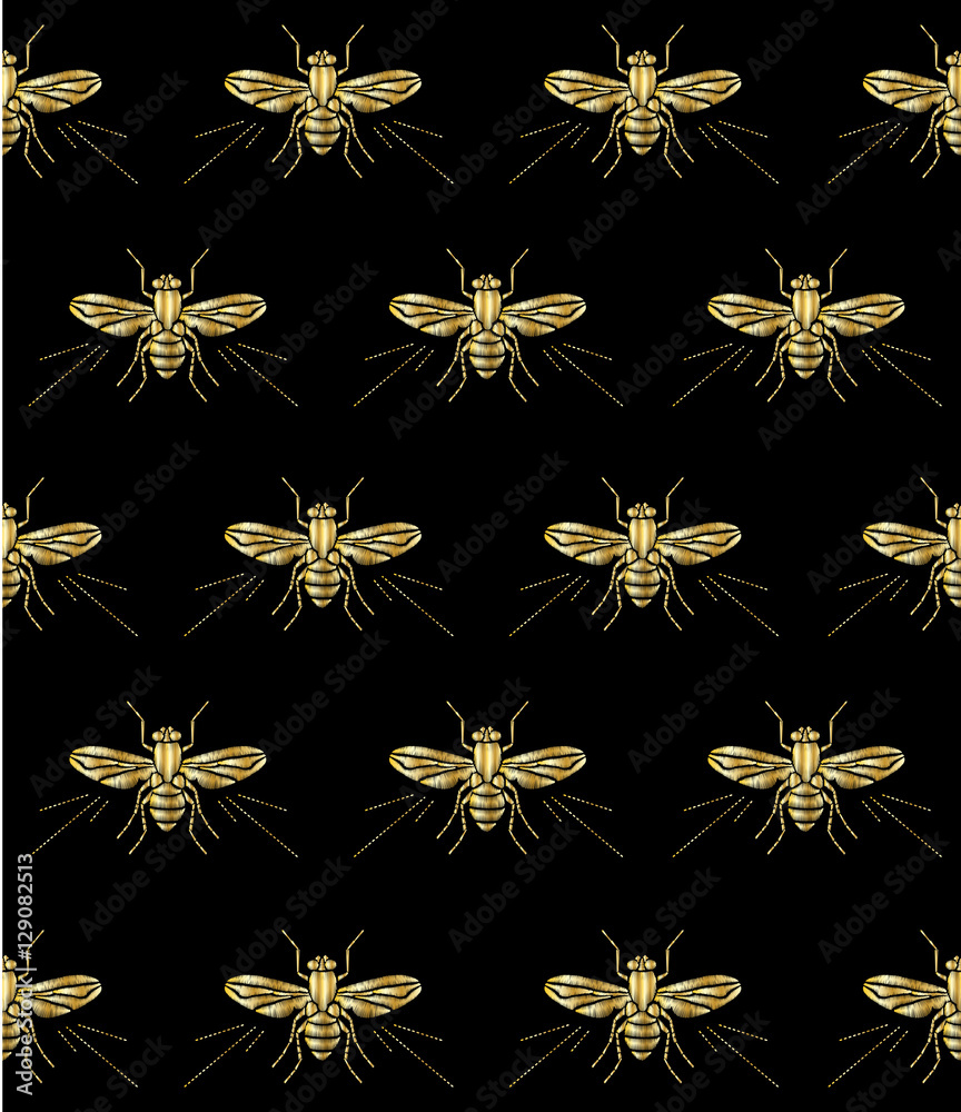 Seamless pattern. Embroidered gold fly on a black background. Insect embroidery Seamless pattern. Embroidered gold fly on a black background. Insect embroidery