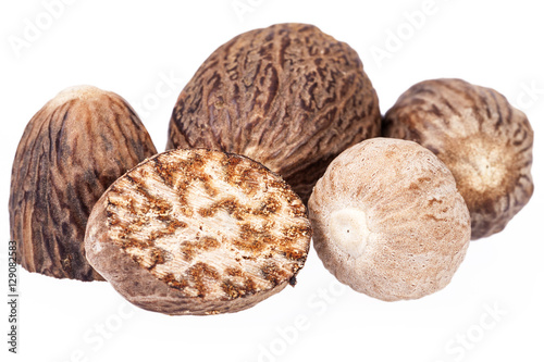 Nutmeg ,  half and whole isolated on white background