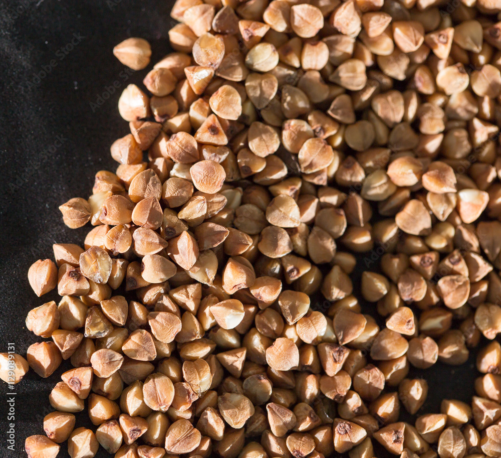 buckwheat on a black background