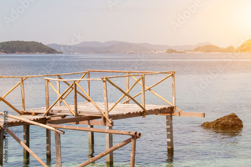 Tropical beach in Kham island  Chonburi  Thailand with light flare effect