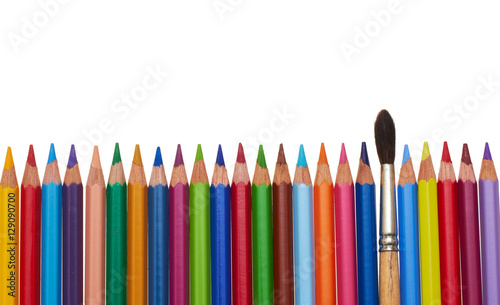 Color pencil row and one paintbrush