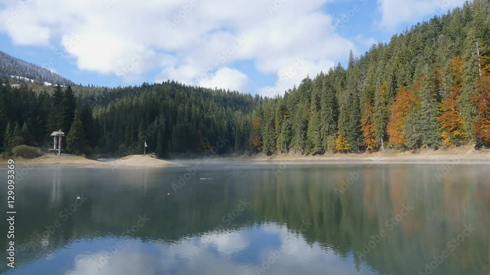 Very beautiful mountain lake in the early autumn. Very beautiful mountain lake in the early autumn.