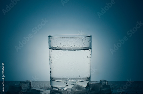 A glass of ice water. Quenching thirst water,