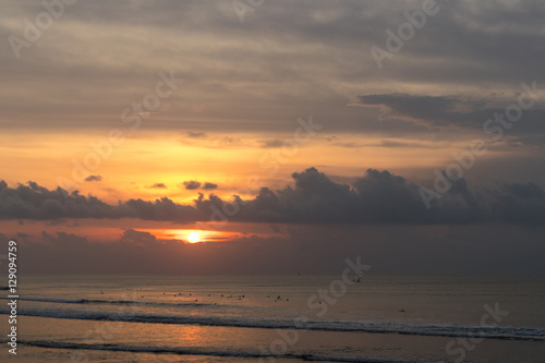Fototapeta Naklejka Na Ścianę i Meble -  Beautiful tropical sunset above the ocean, Bali, Indonesia.