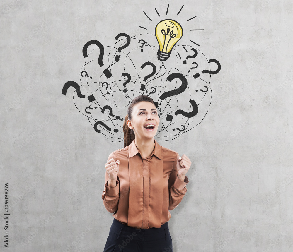 Ecstatic woman, light bulb with question marks Ecstatic woman, light bulb with question marks