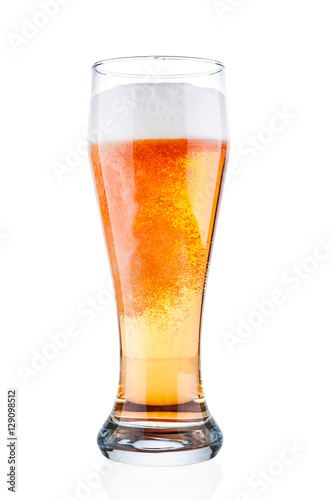 Beer glass closeup on white background