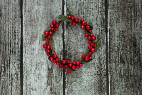 Christmas wreath decorated with red berries