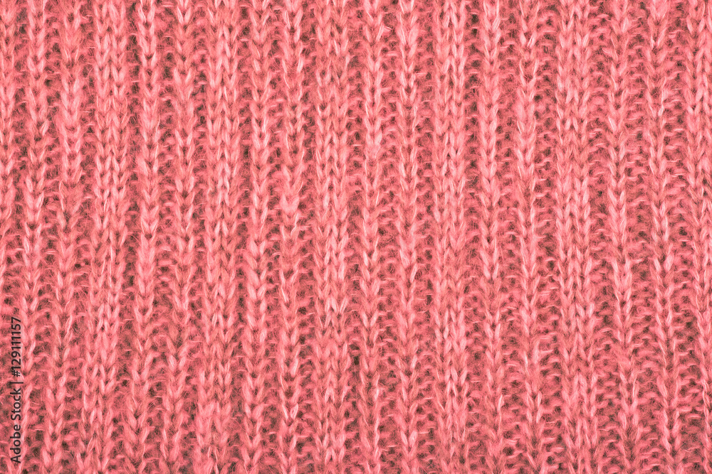 Knitted fabric textured background.