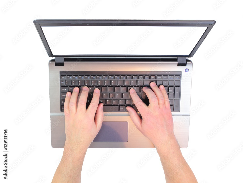 Man hands working on laptop with blank screen, top view shot. on white background Man hands working on laptop with blank screen, top view shot. on white background