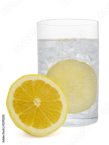 Fresh cold water drink with Lemon on white background