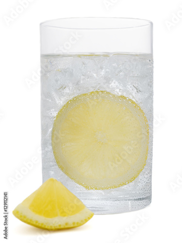 Fresh cold water drink with Lemon on white background