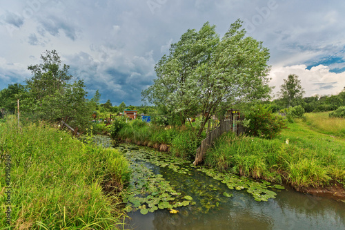 Green field with river