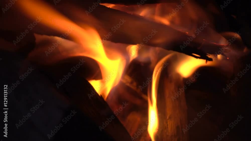 blazing flame in darkness close-up blazing flame in darkness close-up