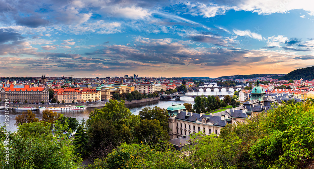 Sunset landscape view to Charles bridge on Vltava river in Prague Czech republic. High resolution image.