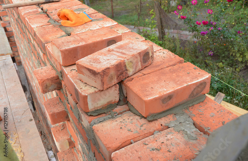 Bricklaying, Brickwork. Bricklaying Tips. How to build a brick wall. Bricklaying photo.