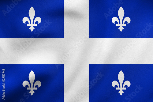 Flag of Quebec waving, real fabric texture