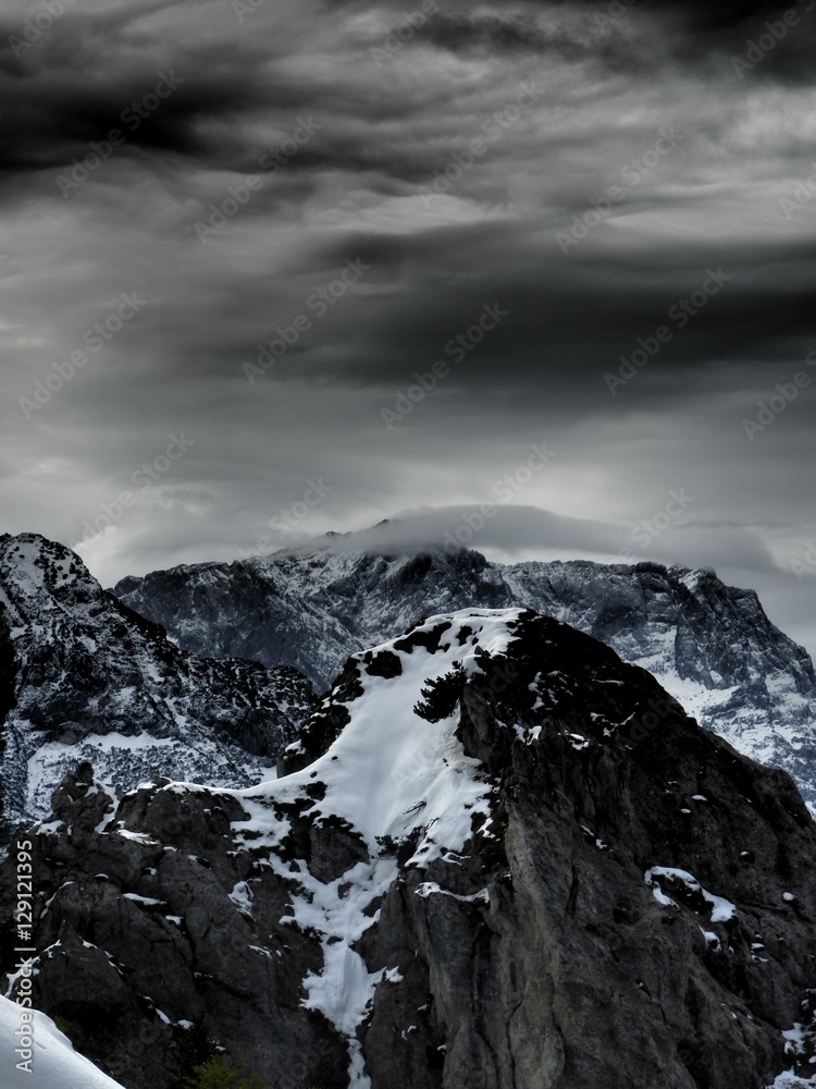 Cloudy mountains at the alps