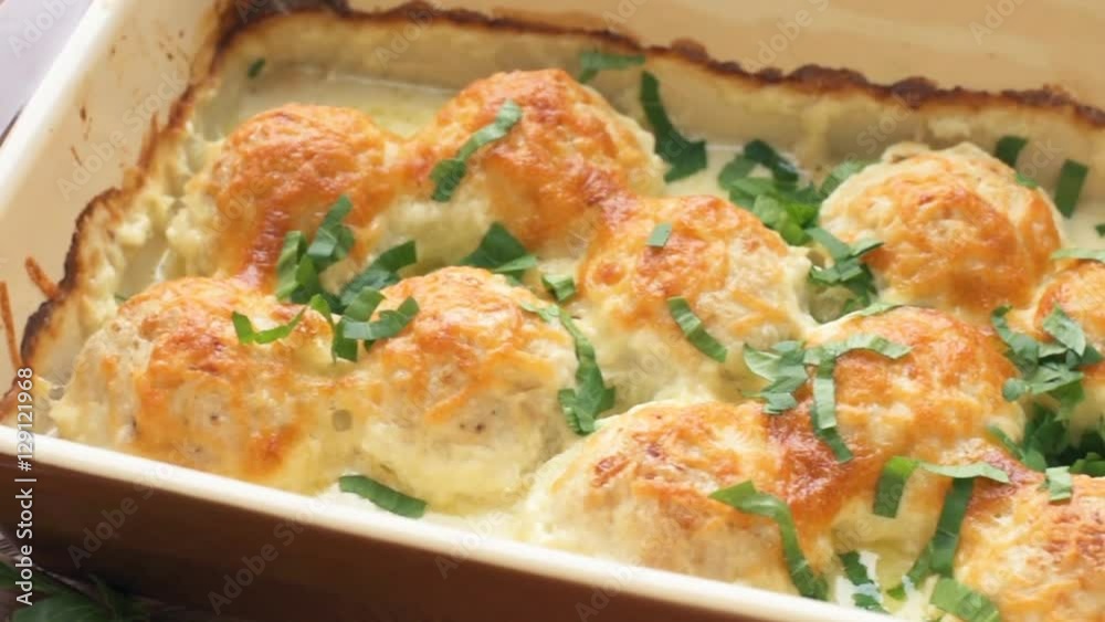 Chicken balls in cream sauce . Chicken balls in cream sauce .