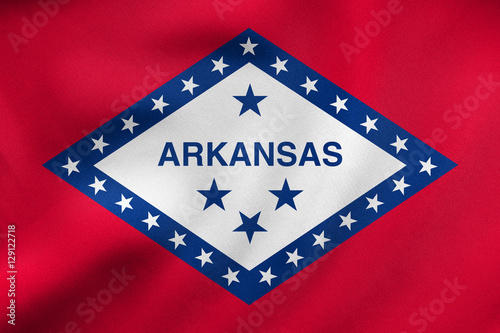 Flag of Arkansas waving, real fabric texture