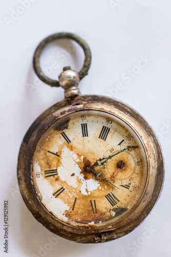 Old silver broken pocket watch.