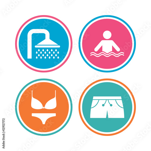 Swimming pool icons. Shower water drops and swimwear symbols. Human stands in sea waves sign. Trunks and women underwear. Colored circle buttons. Vector