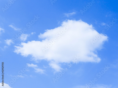 A bright sunny morning sky with clouds.