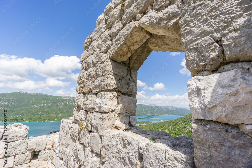 The view from a window in the Walls of Ston, the wall between Ston and Mali Ston in Croatia, looking over the Bay of Mali Ston.
