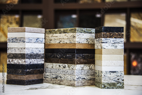 Various of stone color samples for kitchen countertops, granite, marble and quartz in different colors. Brown, gray, dark , white and black.