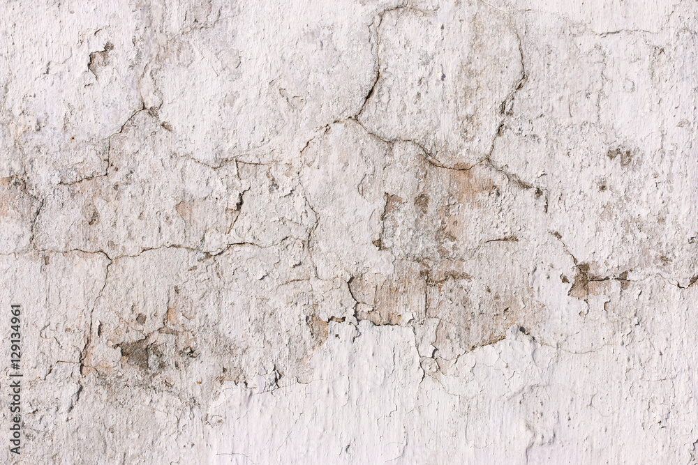 Naklejka premium old cracked plaster wall. background