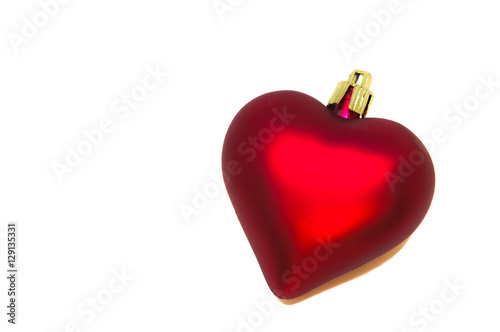 Red heart shaped christmas bauble isolated on white © pfeifferv